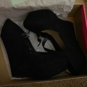 Black suede wedge heels